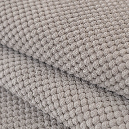 Copertura per divano in peluche di colore solido semplice.